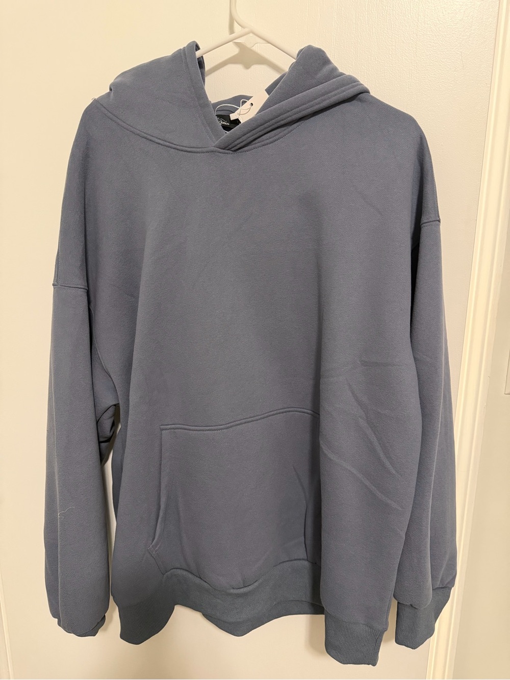 Women's Oversized Hooded Sweatshirt in Dusty Blue.